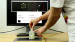 PneuModule: Using Inflatable Pin Arrays for Reconfigurable Physical Controls on Pressure-Sensitive Touch Surfaces